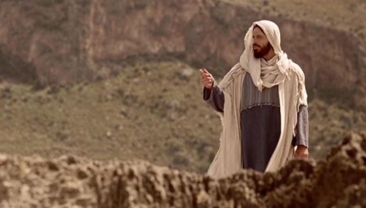 Jesus Christ standing outside, delivering a sermon.