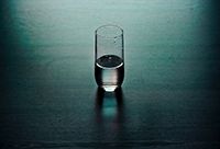 A clear glass of water.