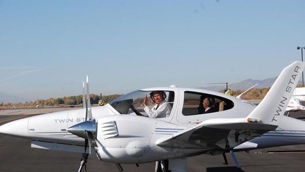 President Uchtdorf in an airplane