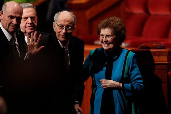 Elder Robert D. Hales waves after an LDS general conference