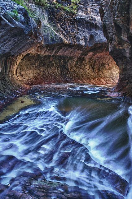 A photo of The Subway, a narrow slot canyon in Zion National Park