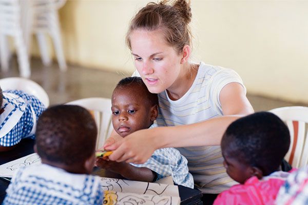 Woman taking care of orphans in Africa
