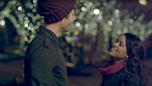 Couple on a date looking lovingly at each other.