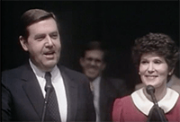 Jeffrey and Patricia Holland at the pulpit, addressing the student body